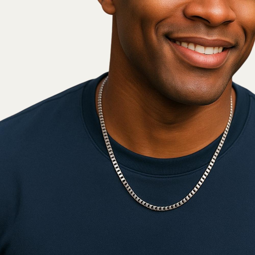 A young man wearing N3VO Stainless steel chain