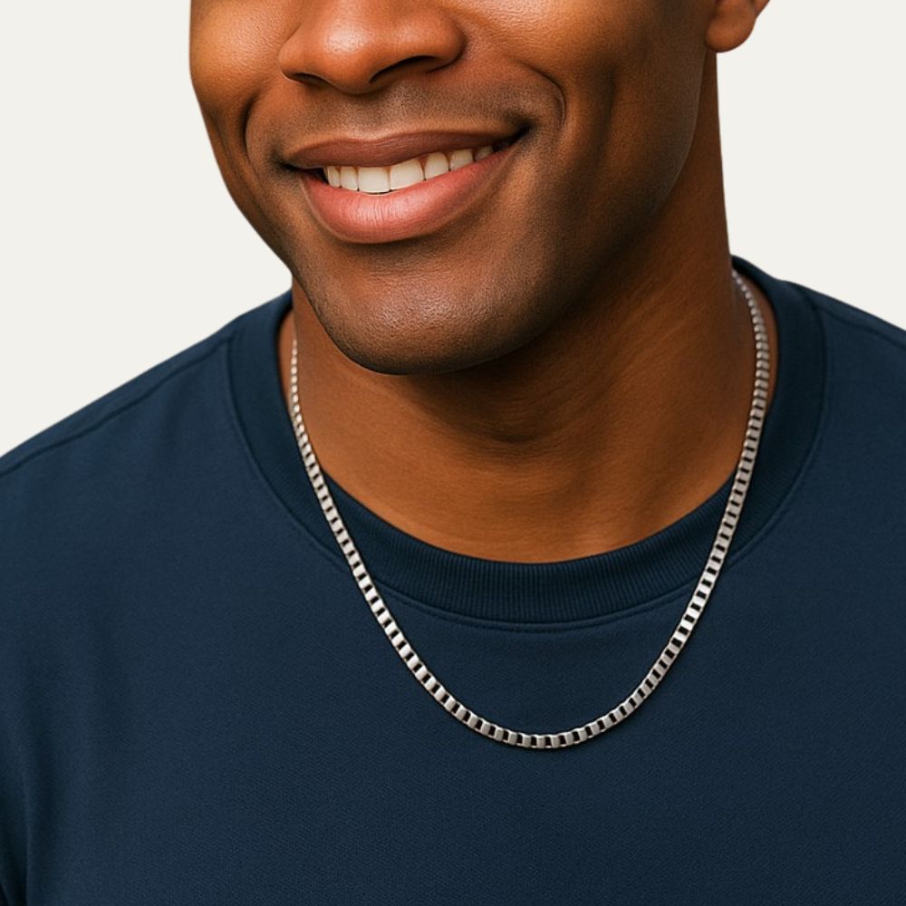 A young man wearing N3VO Stainless steel chain