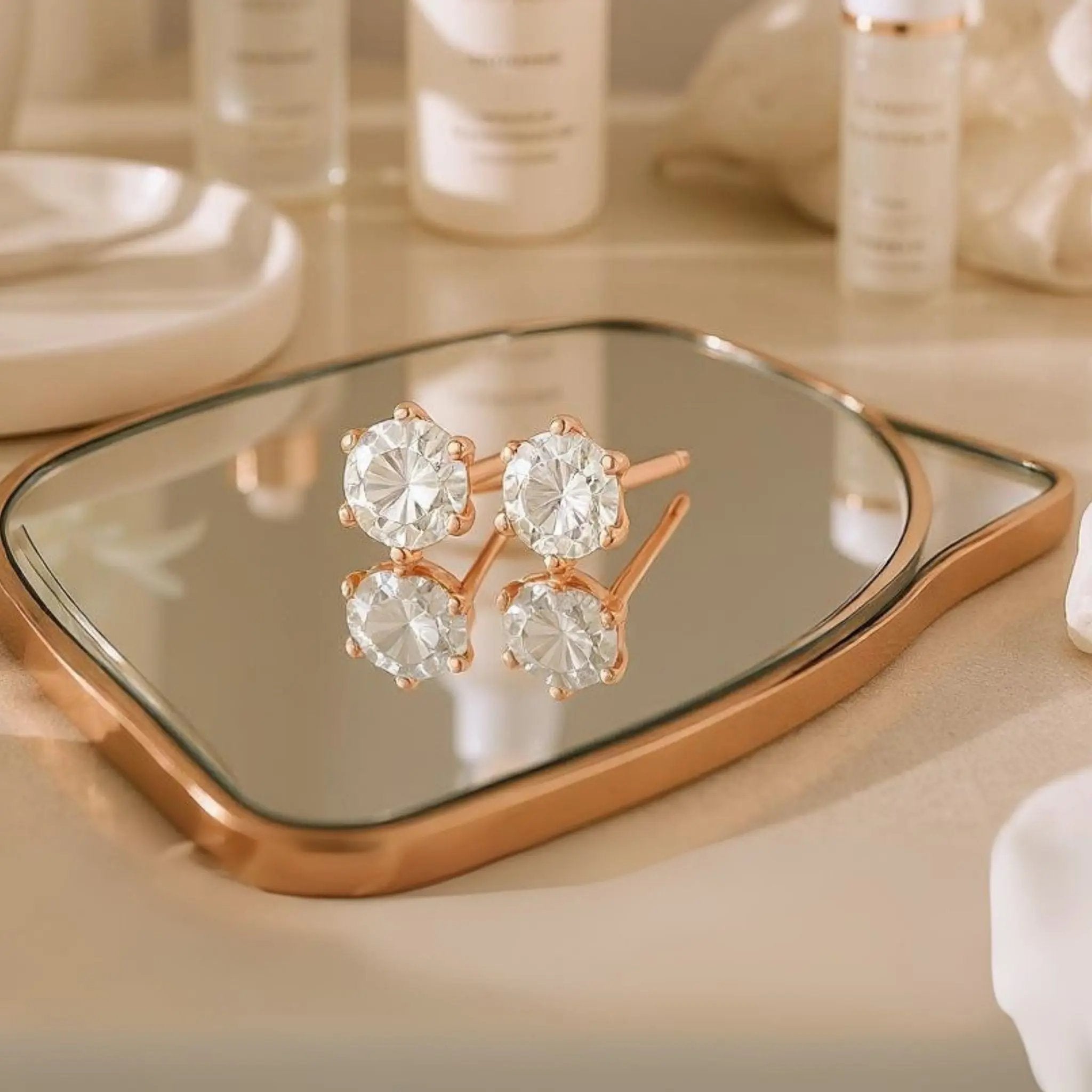 Rosé Solitaire Studs N3VO