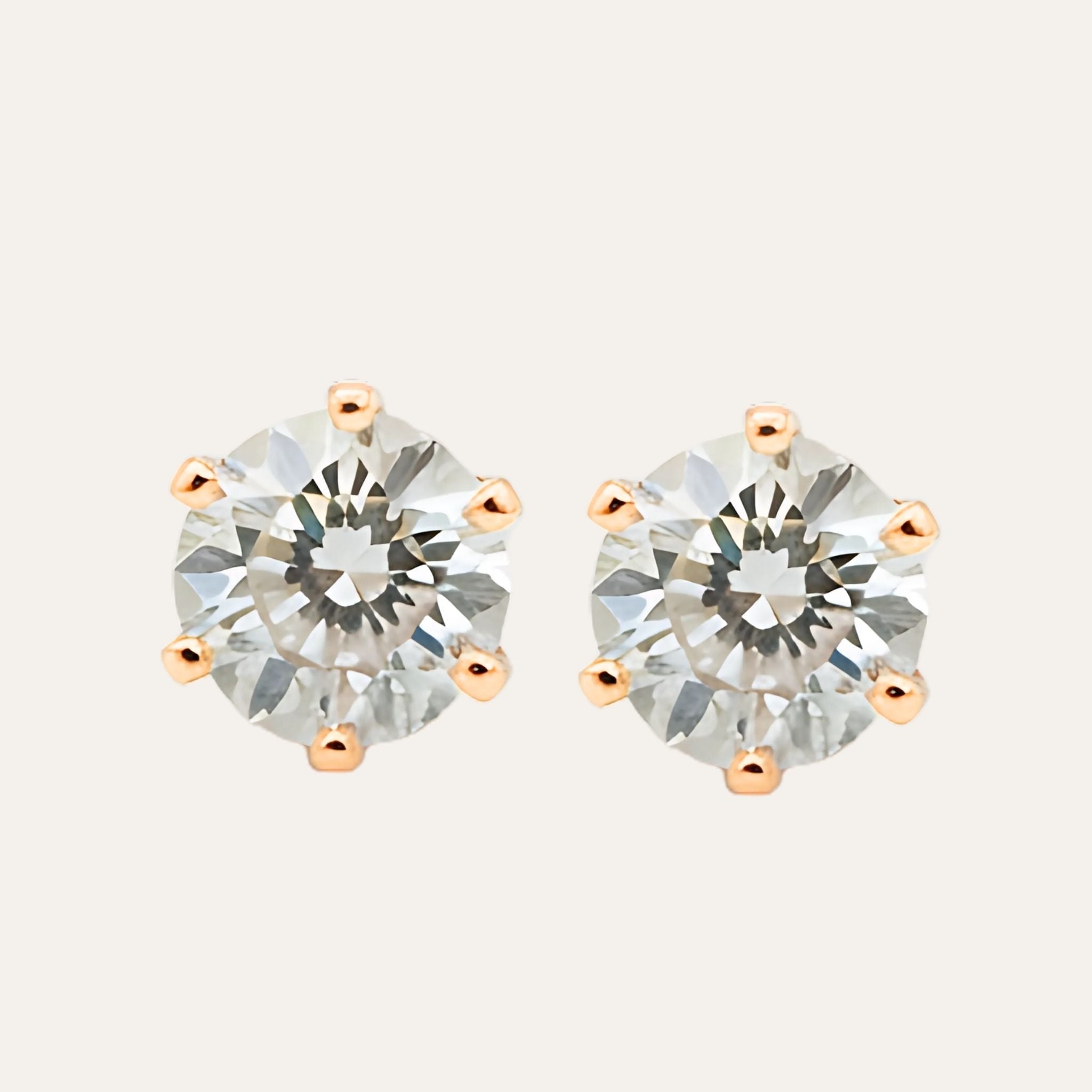 Rosé Solitaire Studs N3VO